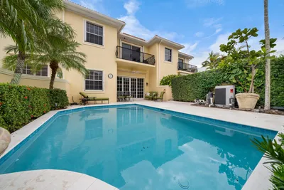 Pool surrounded by shrubbery